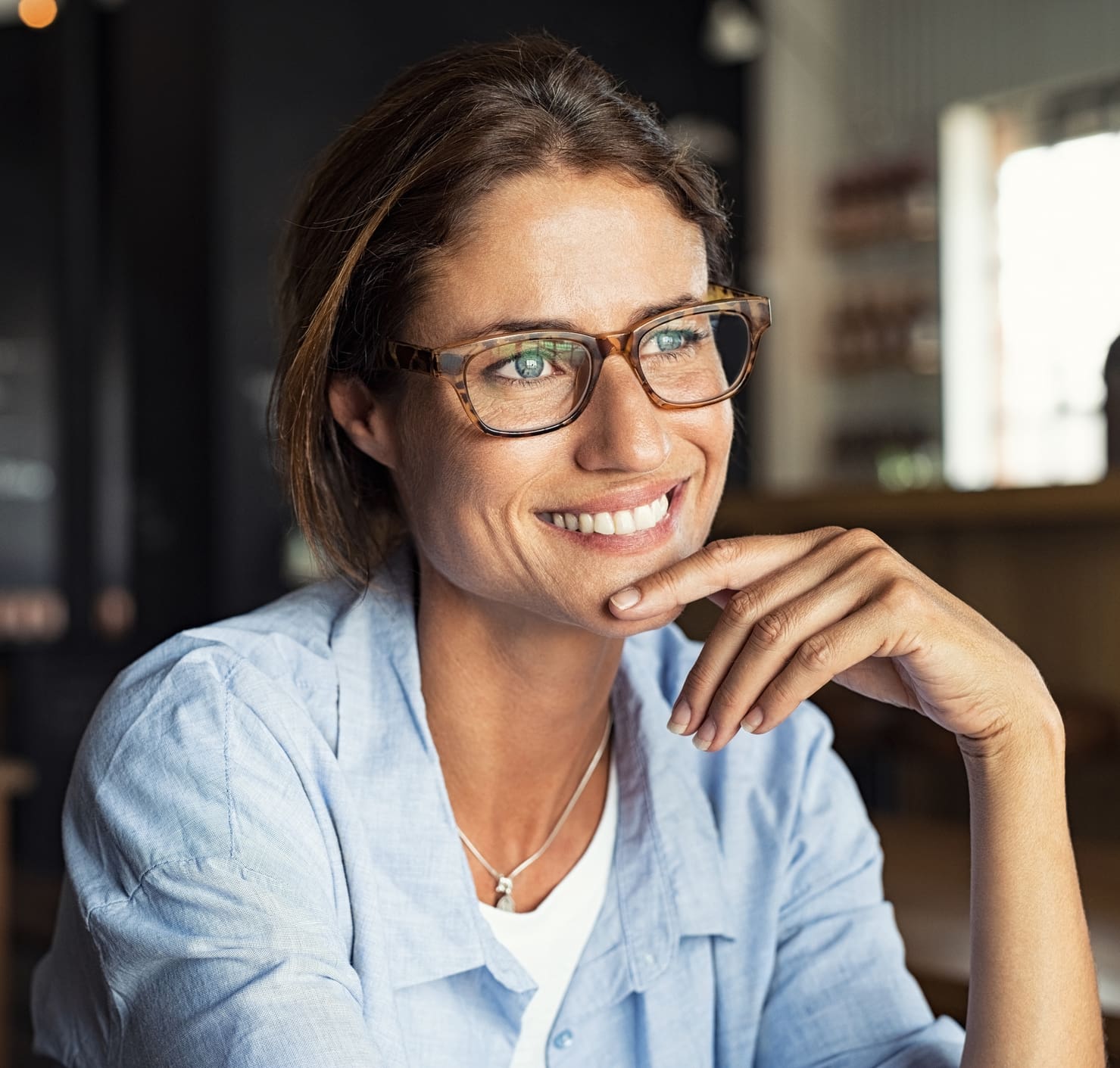 Smiling woman wearing spectacles Xeomin® in Jacksonville, FL